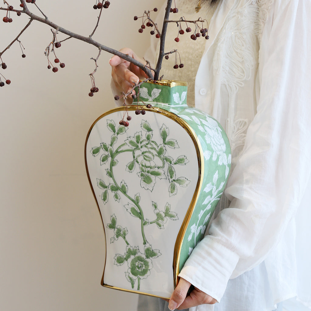 Green peony tall moon flask ceramic vase styled with winter branches