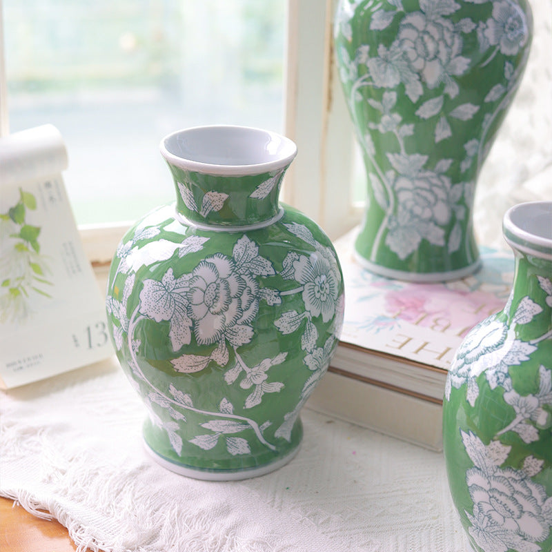Jade green and white floral Chinoiserie ceramic vase, 23 cm high