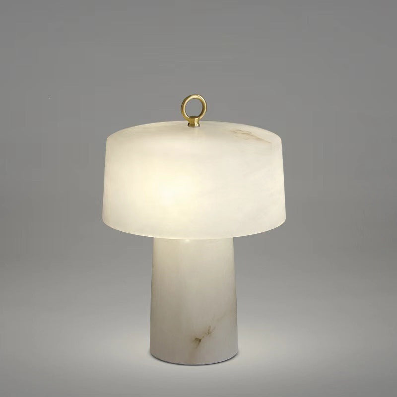 Faux alabaster resin table lamp, approximately 30 cm diameter and 42 cm high
