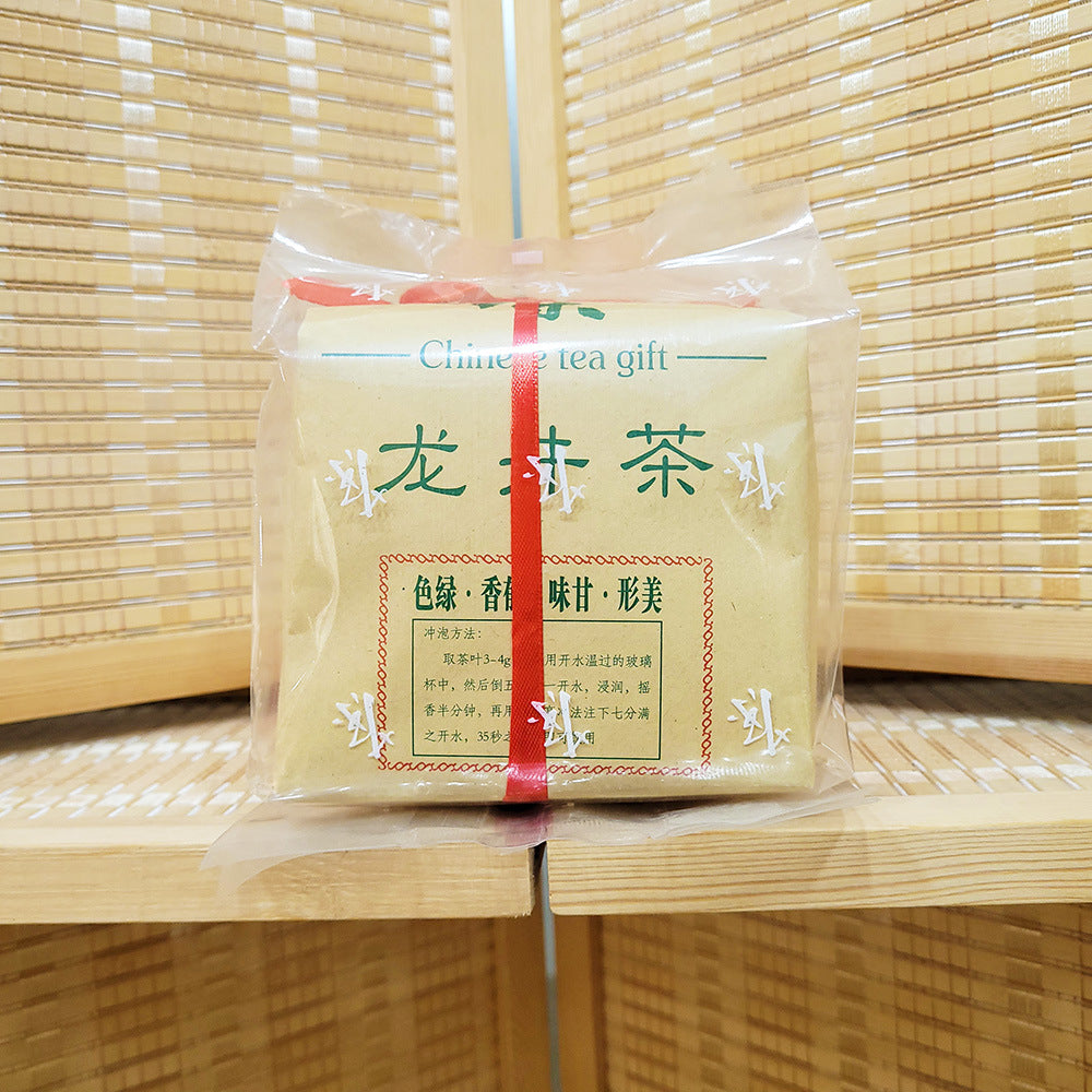 Traditional paper wrapped Hangzhou Longjing Dragon Well green tea