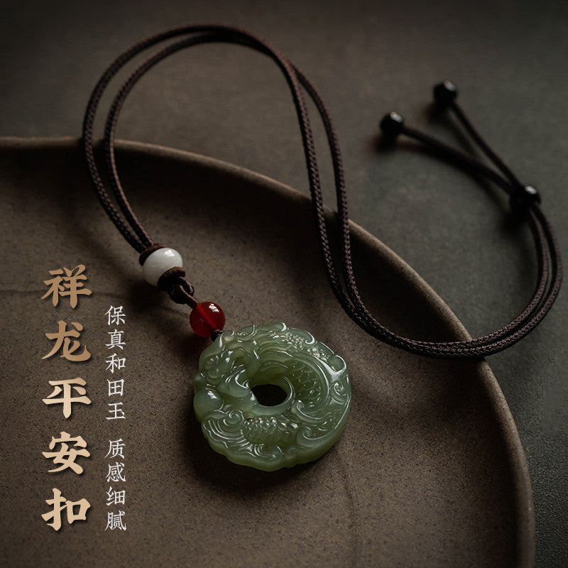 Natural lake green Hetian jade dragon pendant polished round profile