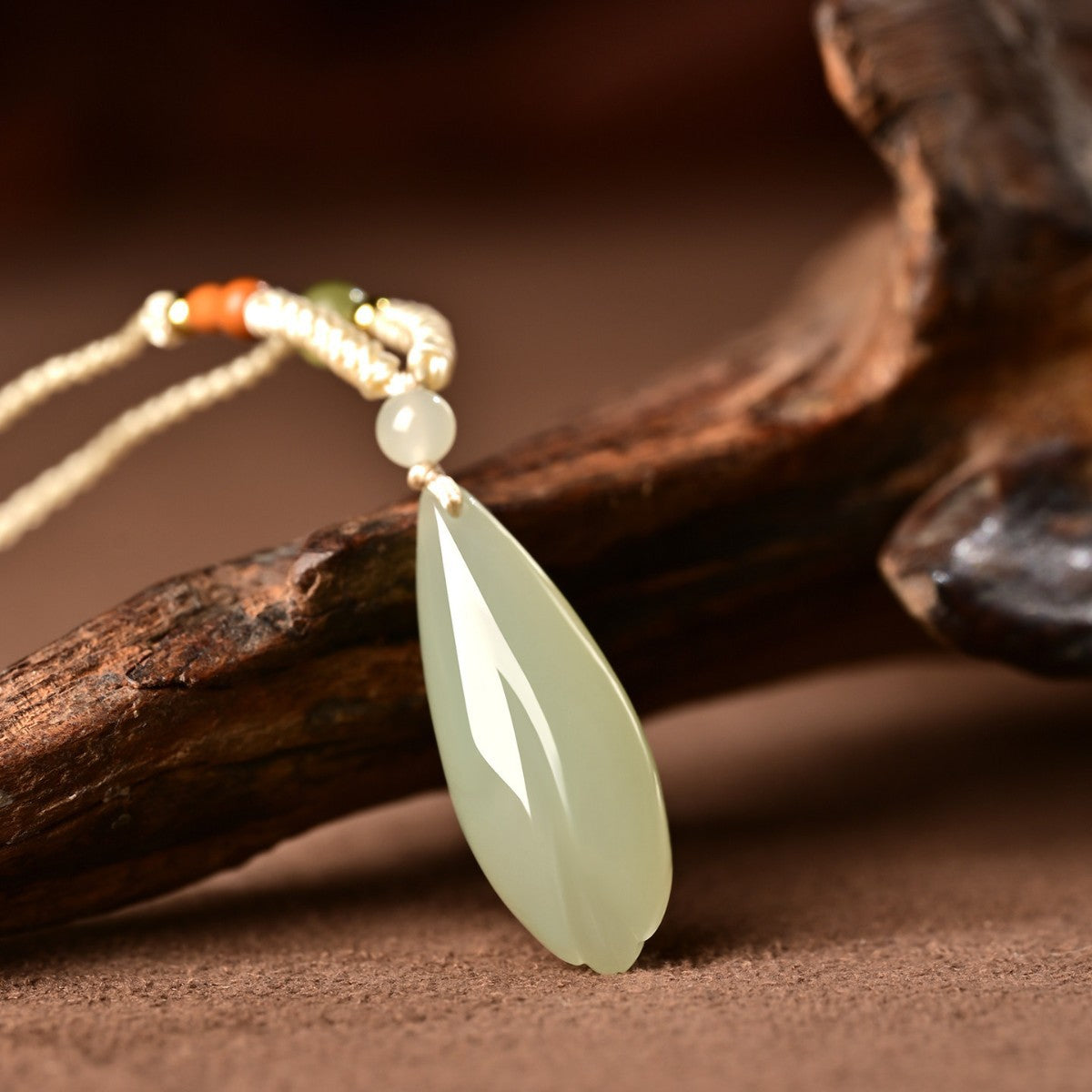 Qing Shui green Hetian jade magnolia pendant lifestyle display