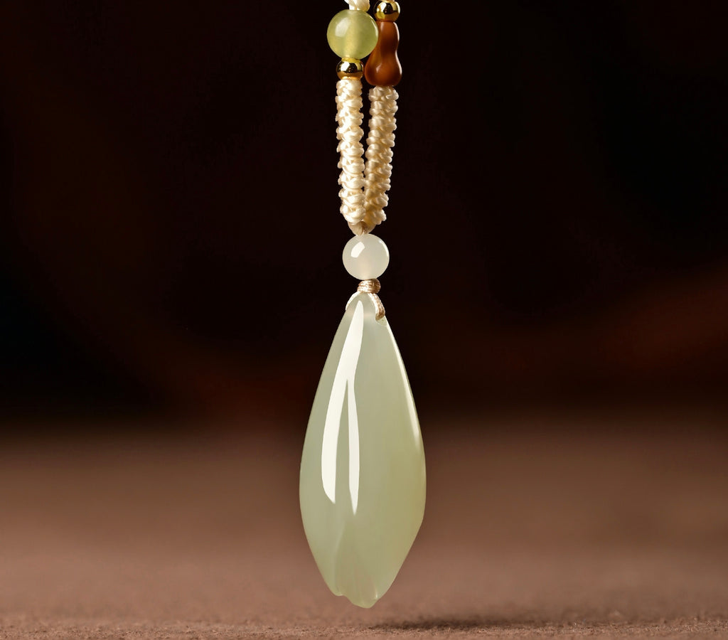 Certified natural Hetian jade magnolia flower pendant in Qing Shui green