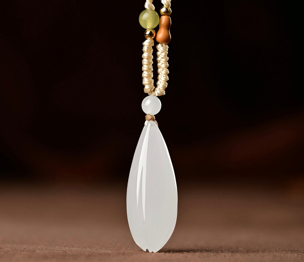 Natural mutton-fat white Hetian jade magnolia flower pendant