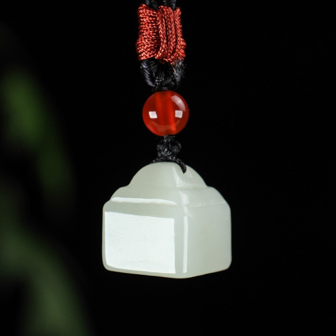 White Hetian jade miniature seal pendant polished front view