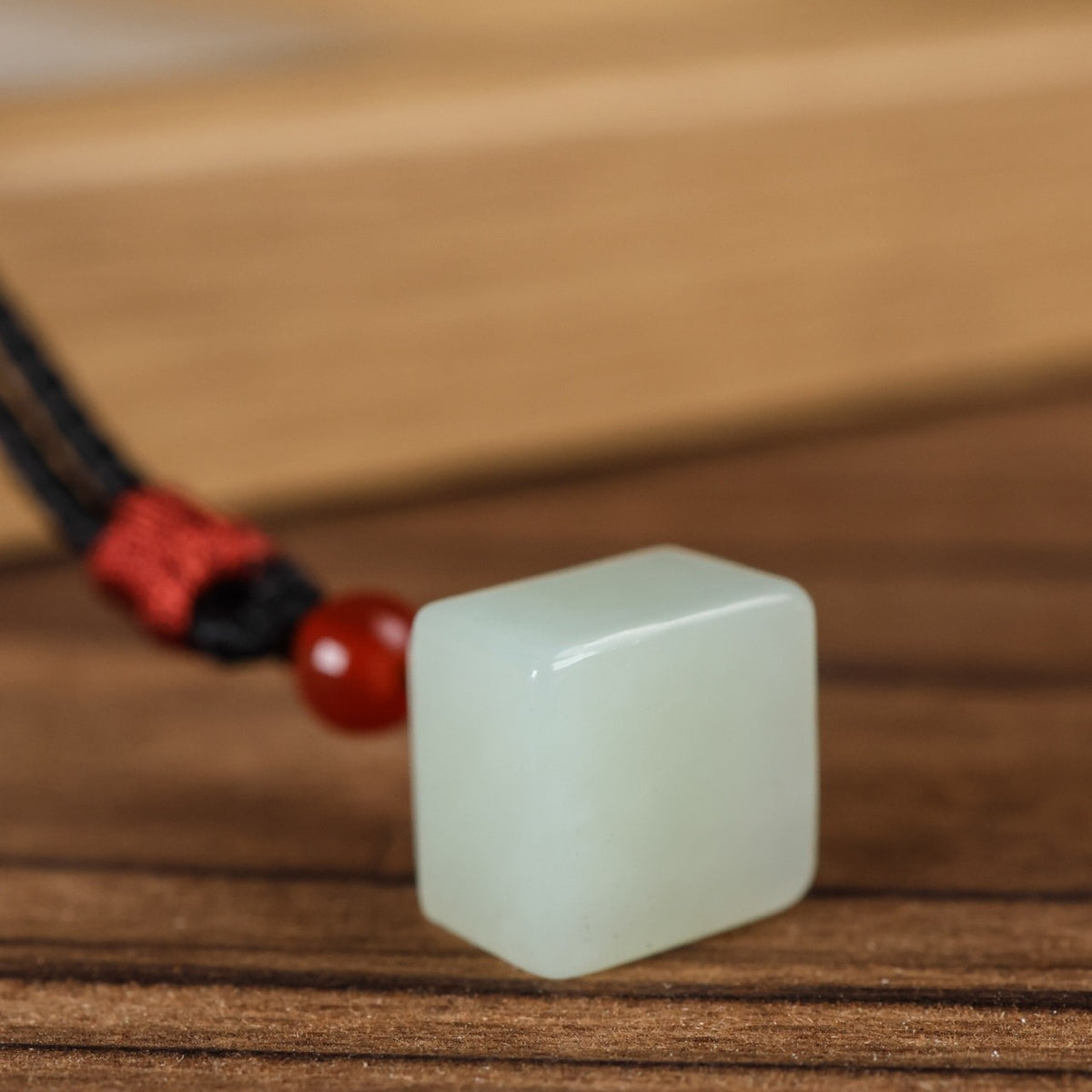 Polished natural Hetian jade miniature seal pendant craftsmanship detail