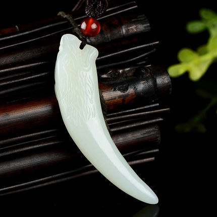 Certified natural Xinjiang Hetian jade wolf fang pendant in pale white nephrite