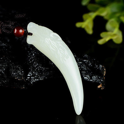 White Hetian jade wolf fang pendant polished curved profile