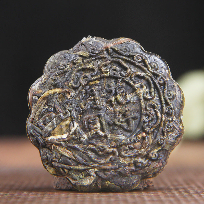 Individually wrapped Huahao Yueyuan raw Pu-erh mini cakes