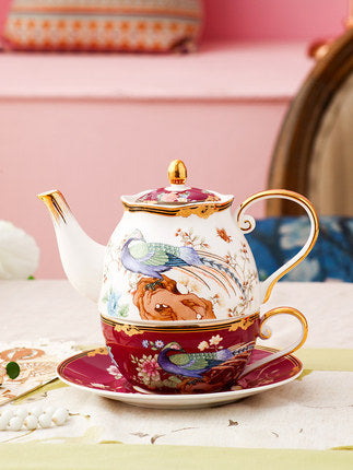 Hundred Birds Blessing red bone china tea-for-one set with stackable teapot, cup and saucer, bird and floral decoration and gold-tone details