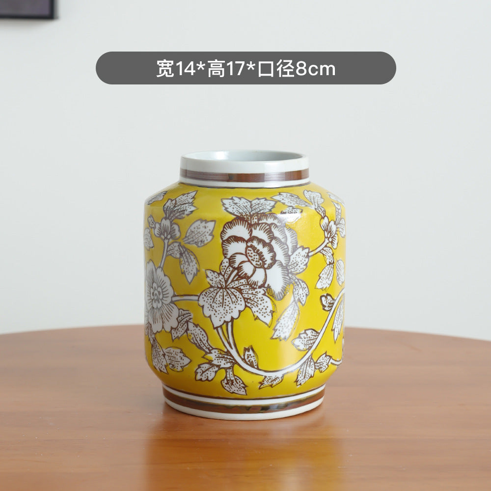 Imperial yellow and silver peony lidded jar, 14 cm wide and 17 cm high
