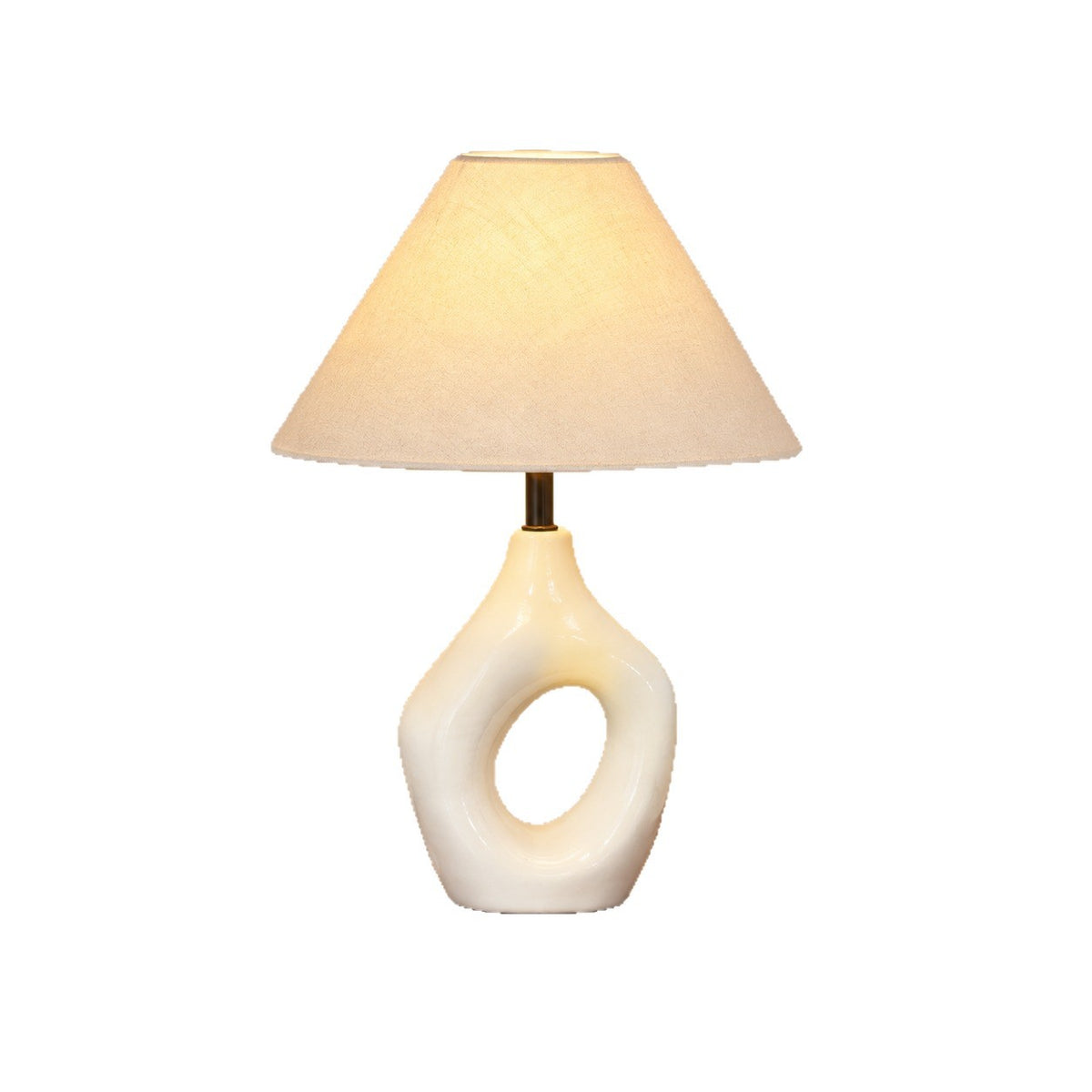 Ivory white sculptural hollow ring ceramic lamp on white background