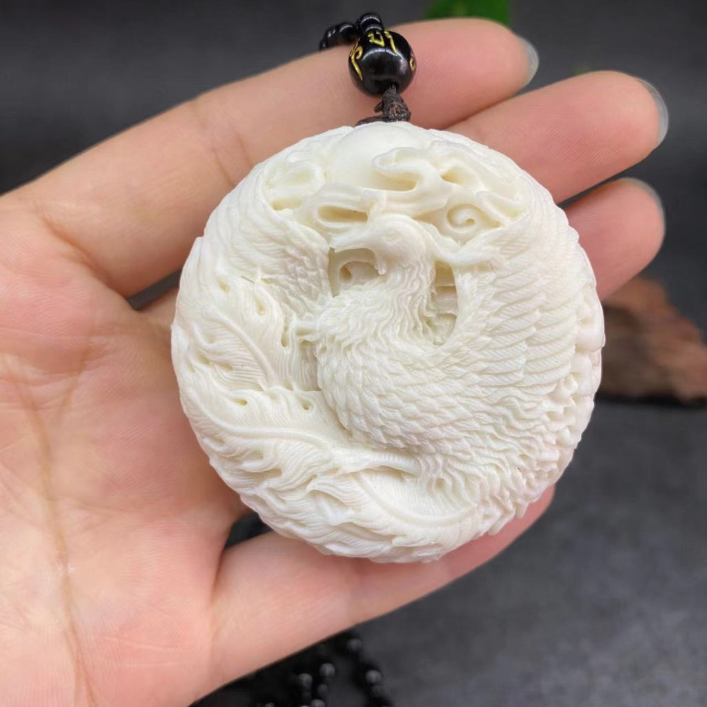 Ivory nut Dragon and Phoenix Long Feng Cheng Xiang round pendant, phoenix-side tagua vegetable ivory Chinese auspicious double-sided carving