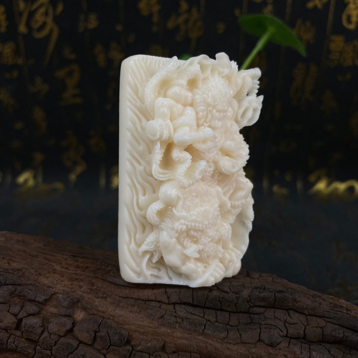 Angled view of ivory nut Mahakala Daheitian wrathful Buddhist protector carving, tagua vegetable ivory Chinese cultural handpiece