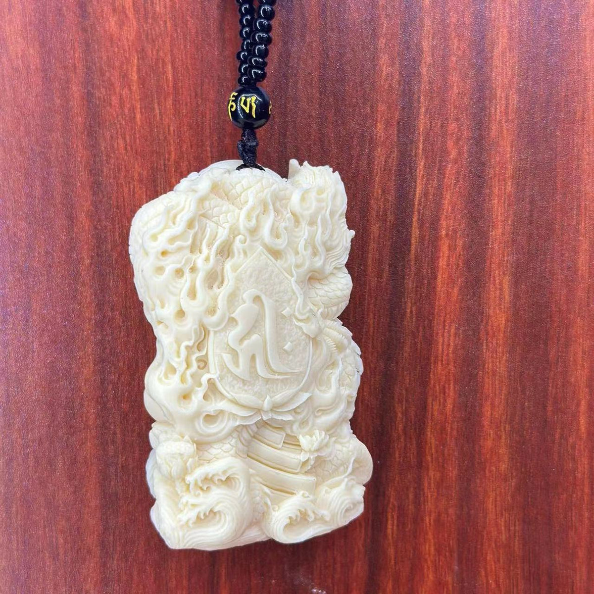 Ivory nut Shakyamuni Buddha with dragon carving and white bead cord, tagua vegetable ivory Chinese Buddhist pendant and car hanging ornament