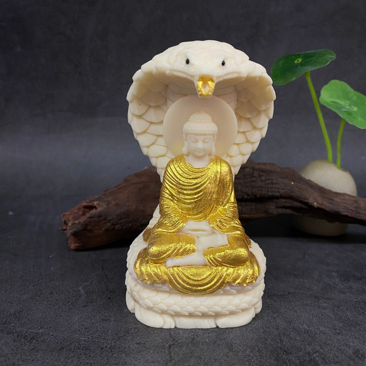 Ivory nut Vairocana Buddha beneath cobra hood, natural tagua vegetable ivory Buddhist statue
