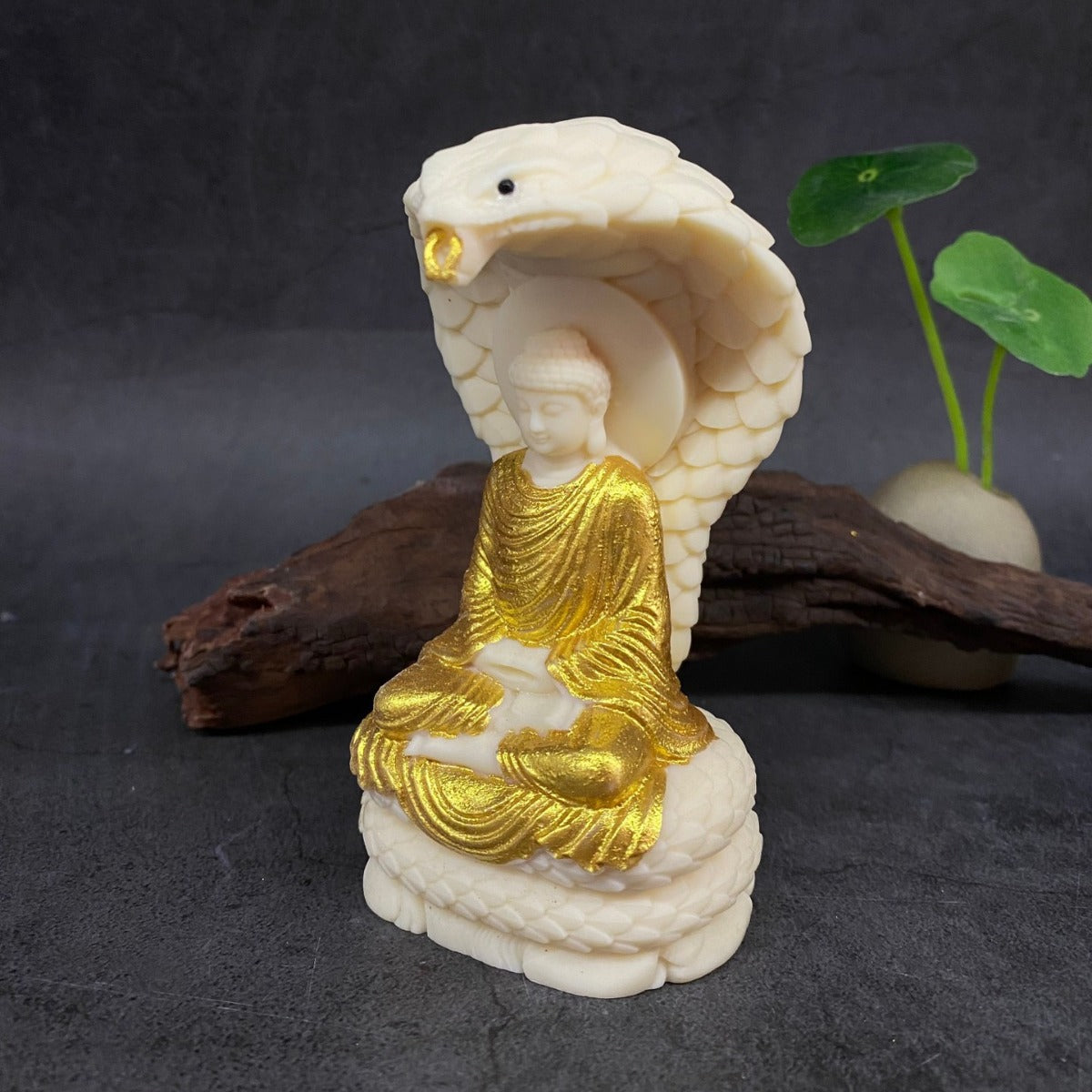 Gold-accented ivory nut Vairocana Buddha seated beneath serpent hood, Buddhist tea room and study decor