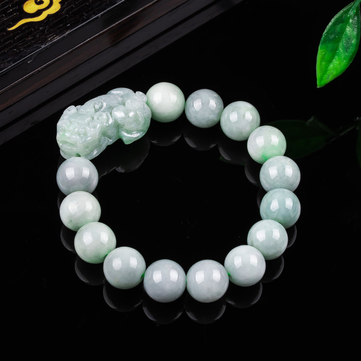 Natural jadeite 14mm round bead bracelet with Ruyi Pixiu carving