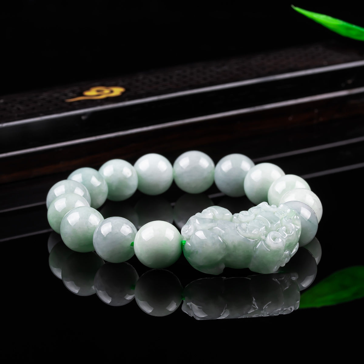 Natural certified jadeite Pixiu and Ruyi bracelet close-up