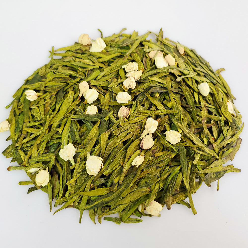 Flat Longjing green tea leaves scented with jasmine