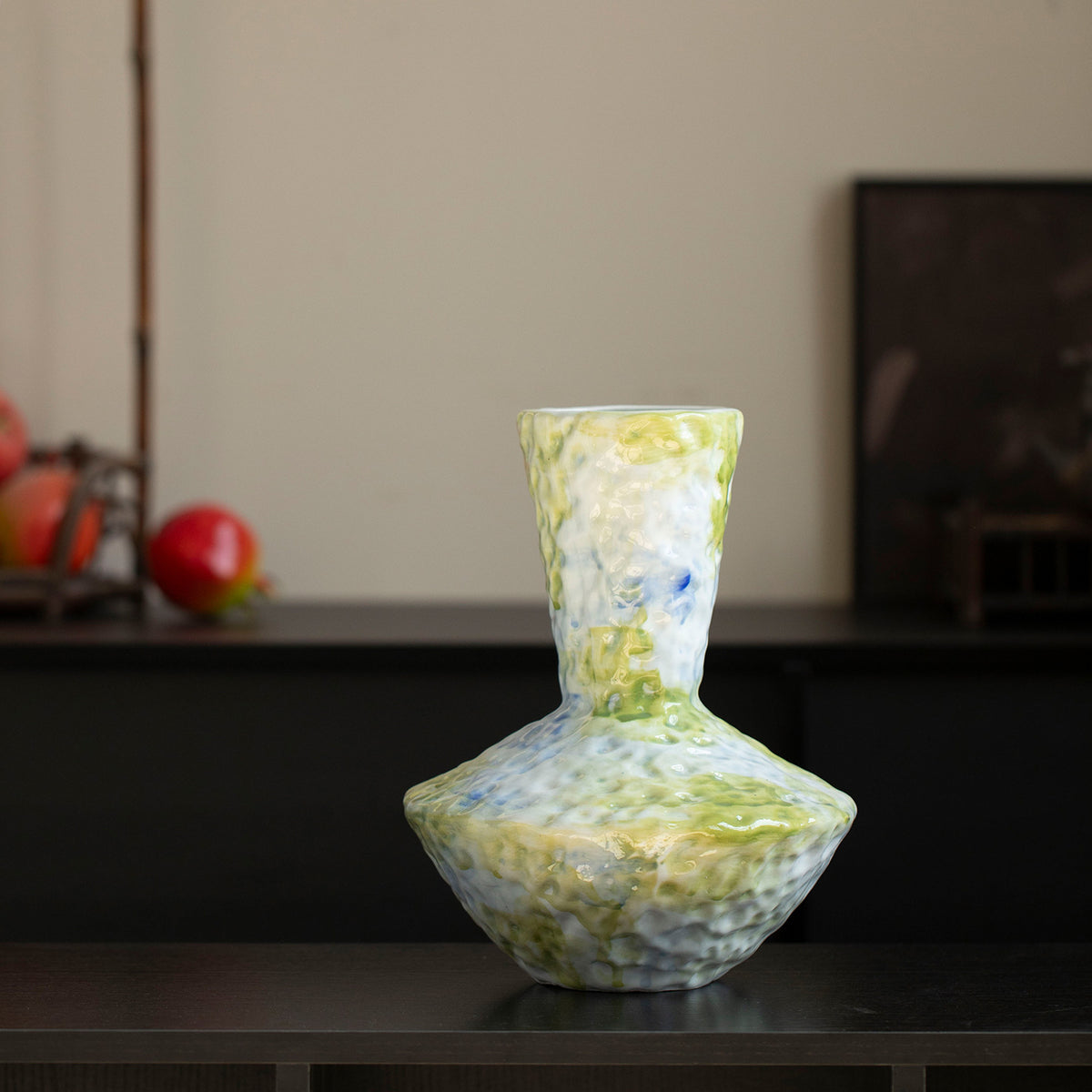 Jingdezhen blue-green textured ceramic vase styled in a tea room