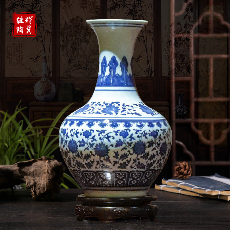 Blue and white lotus scroll porcelain vase styled in a traditional Chinese interior