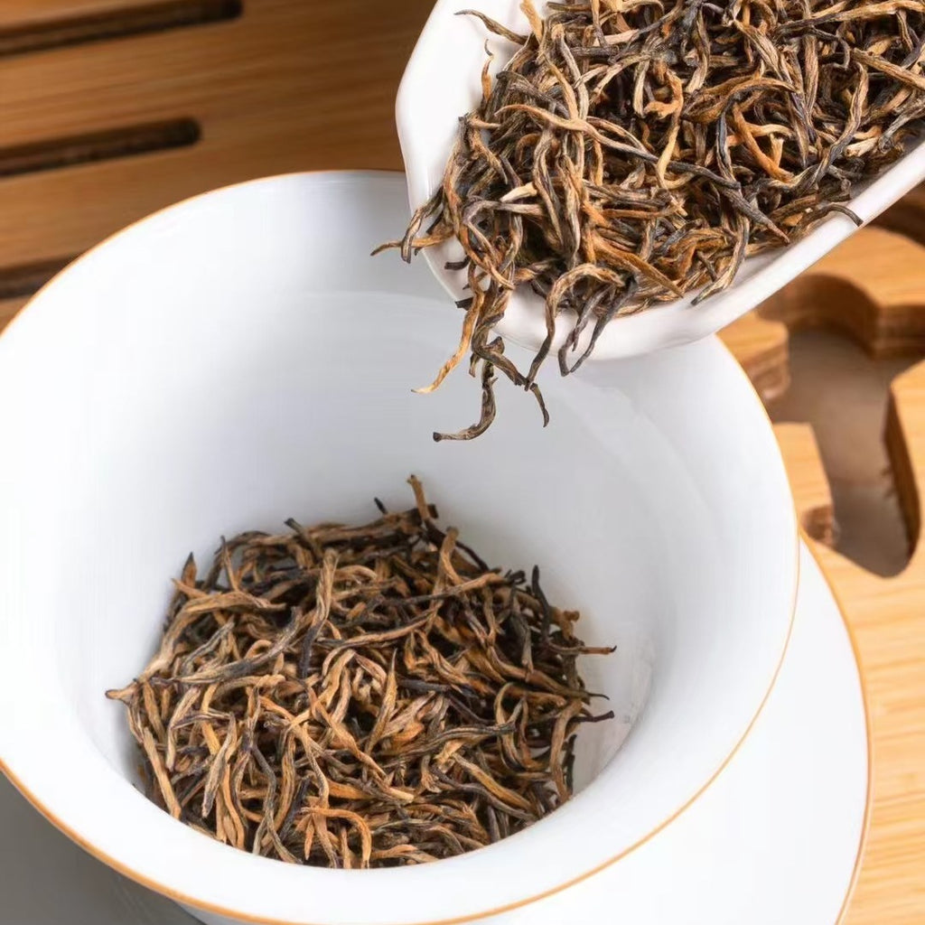 Fine golden-tipped Jin Jun Mei black tea leaves