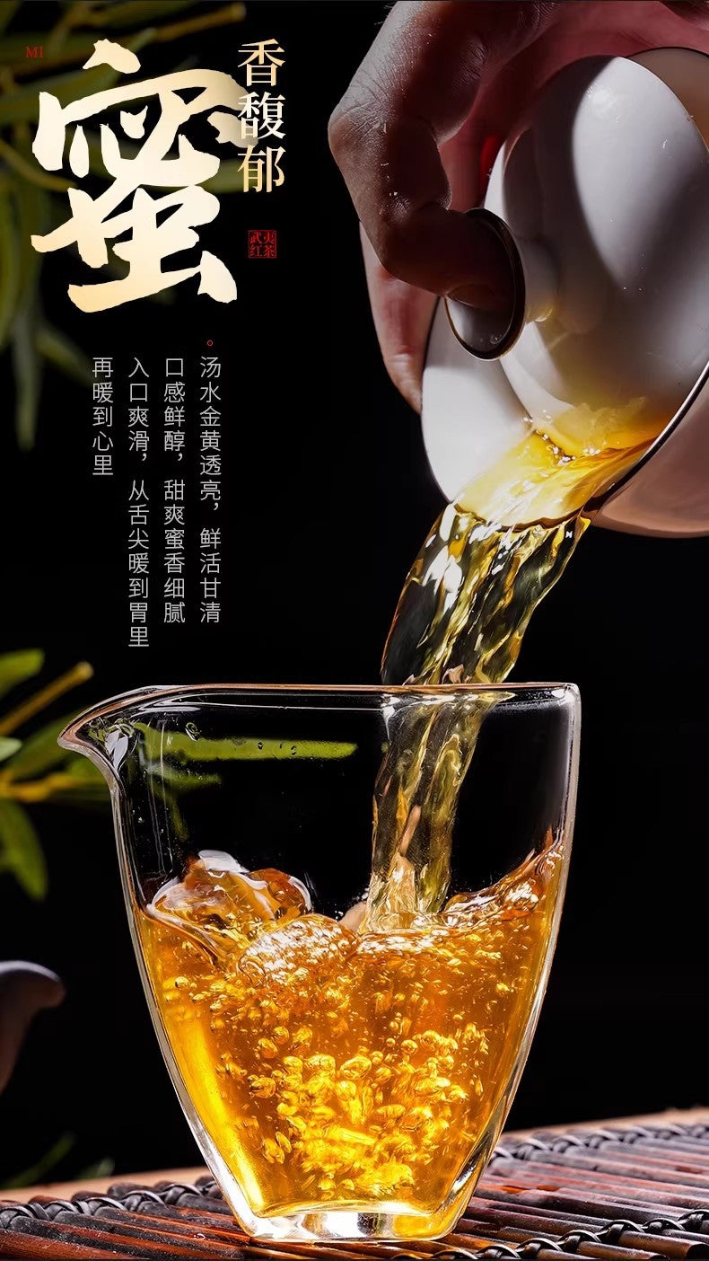 Golden Jin Jun Mei black tea liquor in glass pitcher