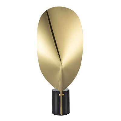 Gold leaf-form sculptural table lamp with black cylindrical base