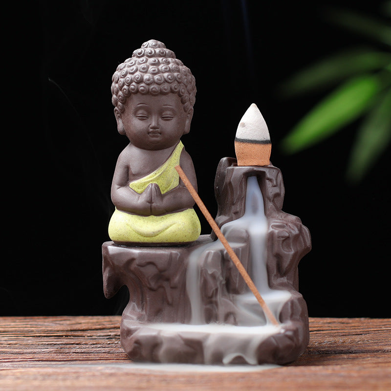 Little Buddha backflow incense burner with yellow robe
