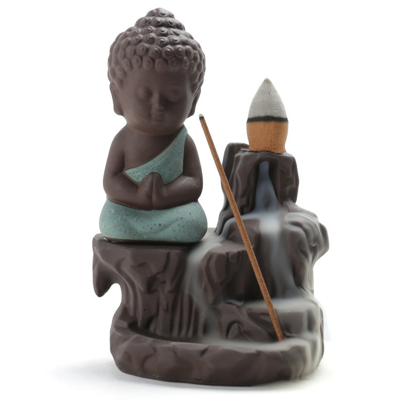 Little Buddha backflow incense burner on white background