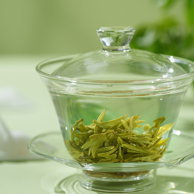 Flat pan-fired Longjing green tea leaves