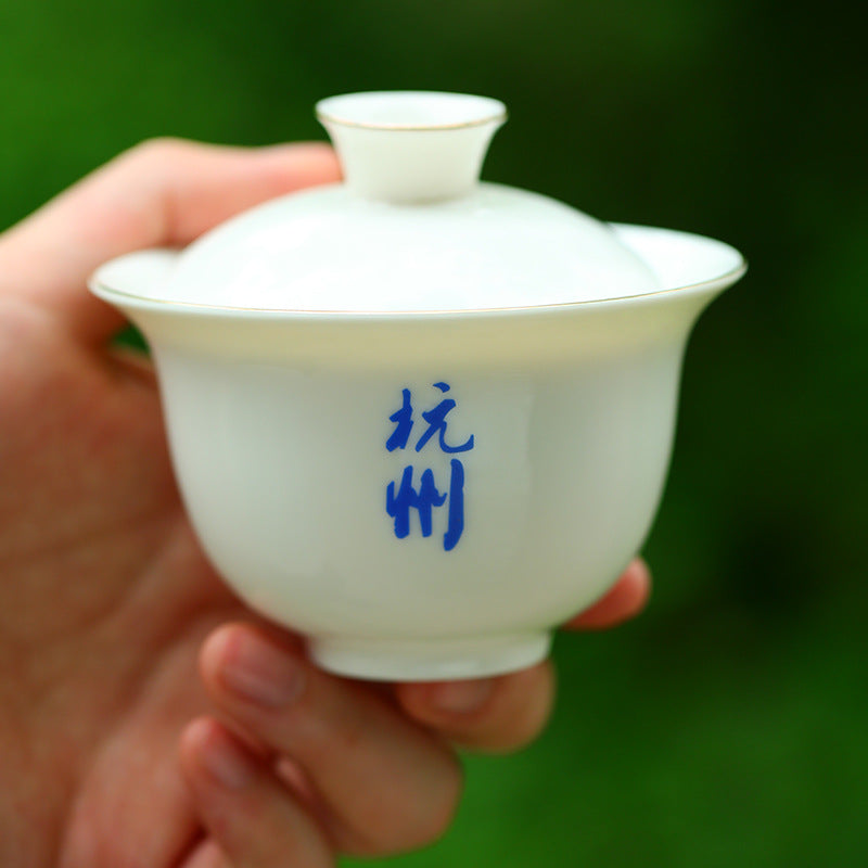 Mingqian Longjing flat green tea leaves and tea set