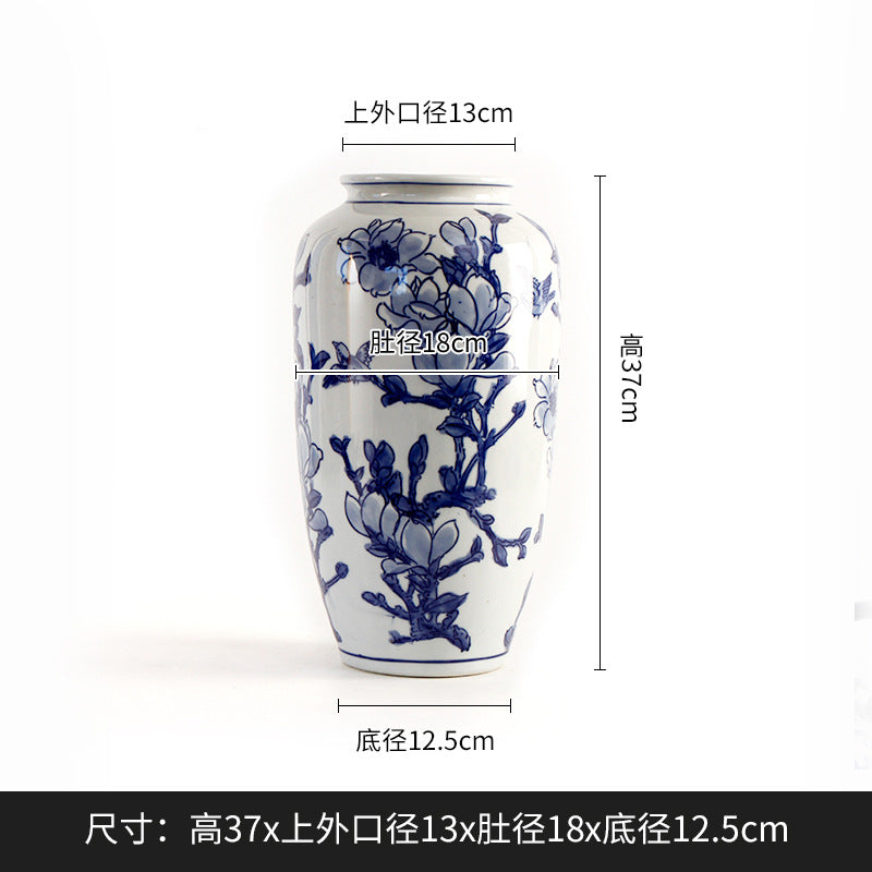 Blue and white magnolia radish vase, 37 cm high