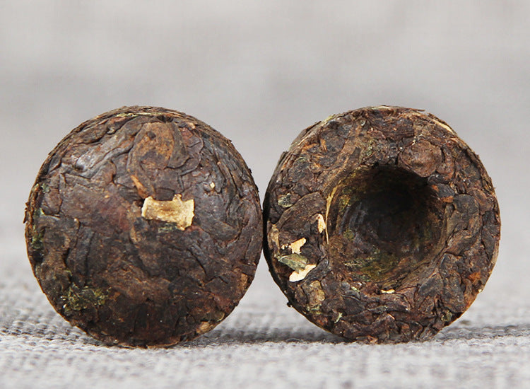 Menghai sticky rice aroma ripe Pu-erh mini tuocha unwrapped tea detail