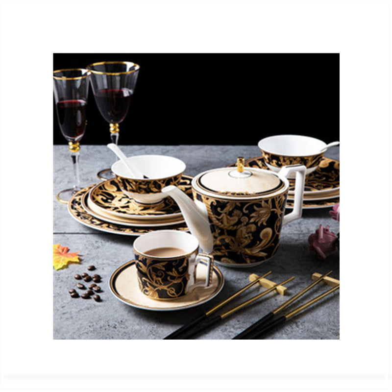 Midnight black and gold bone china tableware collection with teapot, cup and saucer, plates, bowl and chopsticks