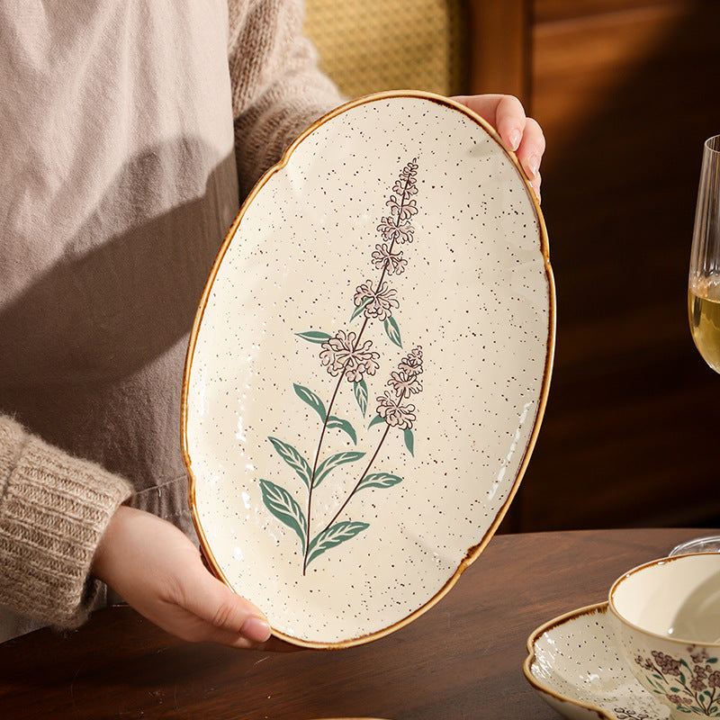 Mo Ran Hua Shi vintage botanical oval fish platter with speckled ivory glaze and warm coloured edging