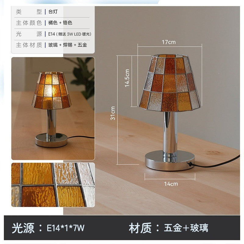 Orange stained glass table lamp, approximately 31 cm high with metal and glass construction