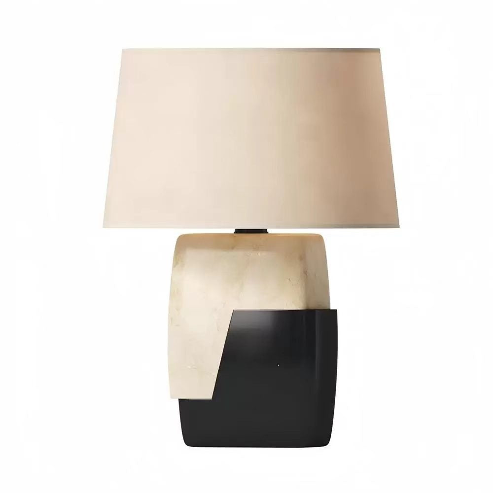 Black lower block and ivory upper block sculptural table lamp with cream shade