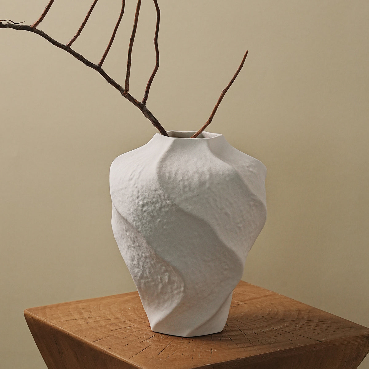 White small sculptural mountain spiral vase in warm interior