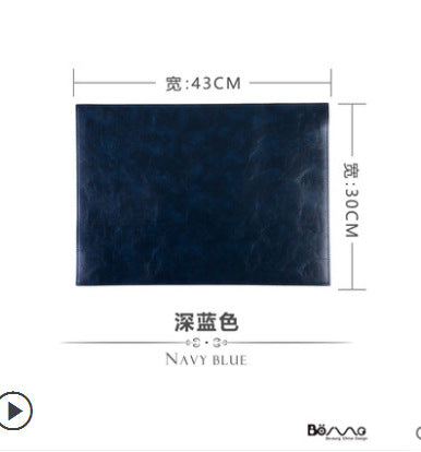 Navy blue rectangular dining placemat, approximately 43 by 30 cm