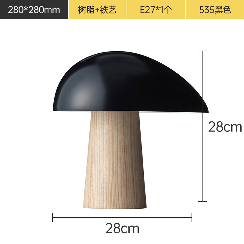 Black resin and iron mushroom table lamp with natural wood-look base, 28 cm wide and 28 cm high