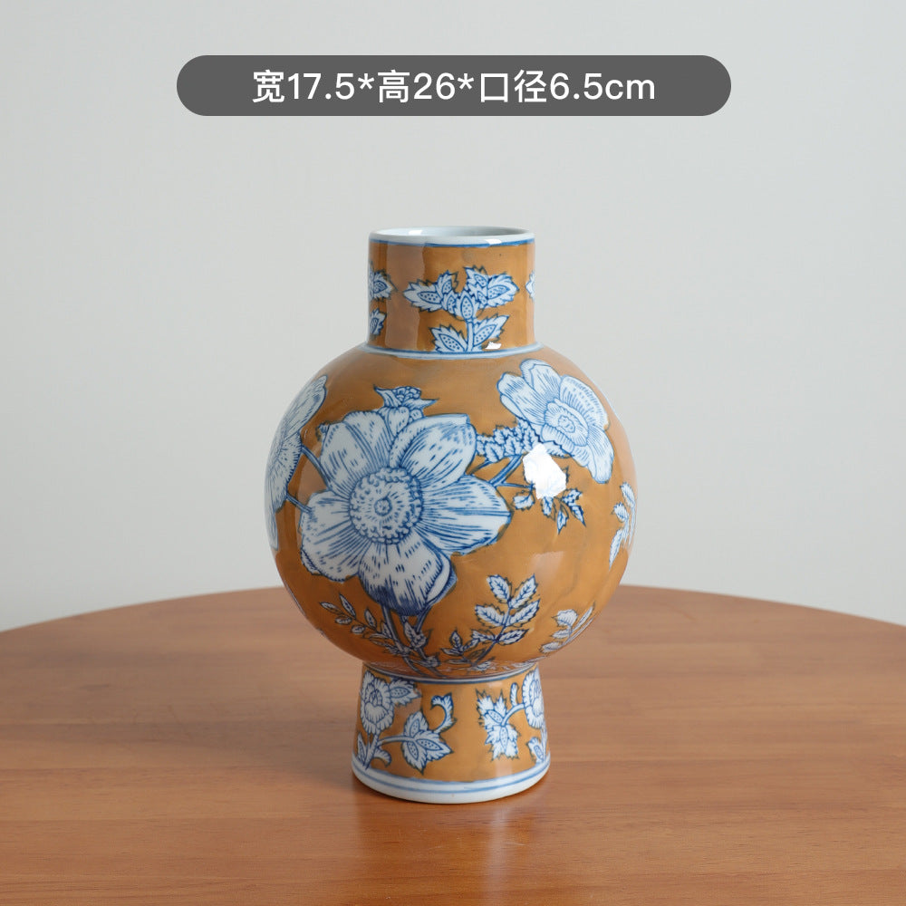 Ochre and blue peony pedestal vase, 17.5 cm wide and 26 cm high