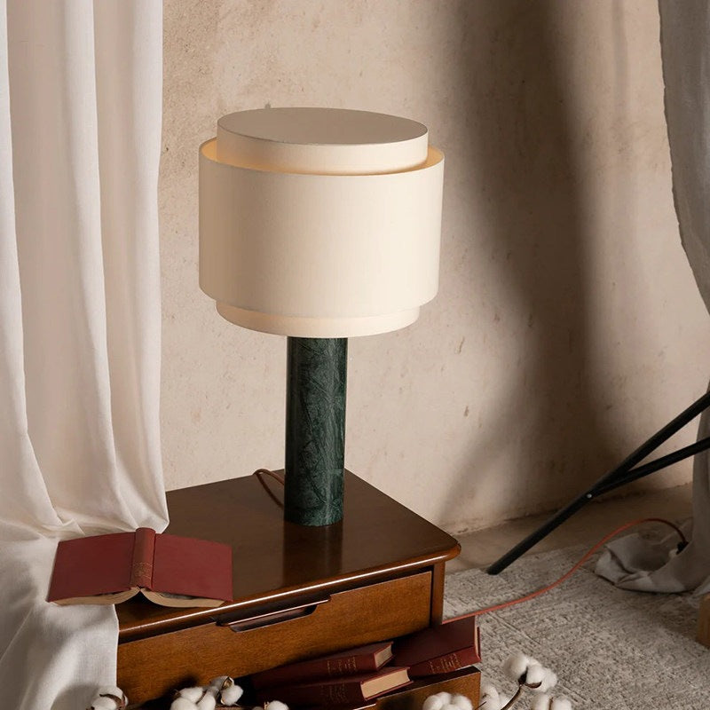 Designer green marble table lamp with layered cream cylindrical fabric shade