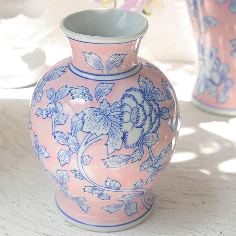 Blush pink and blue floral ceramic vase close-up