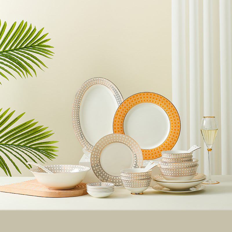 Provence lattice bone china 28-piece dinnerware set with ivory, platinum grey and saffron orange patterned plates and bowls