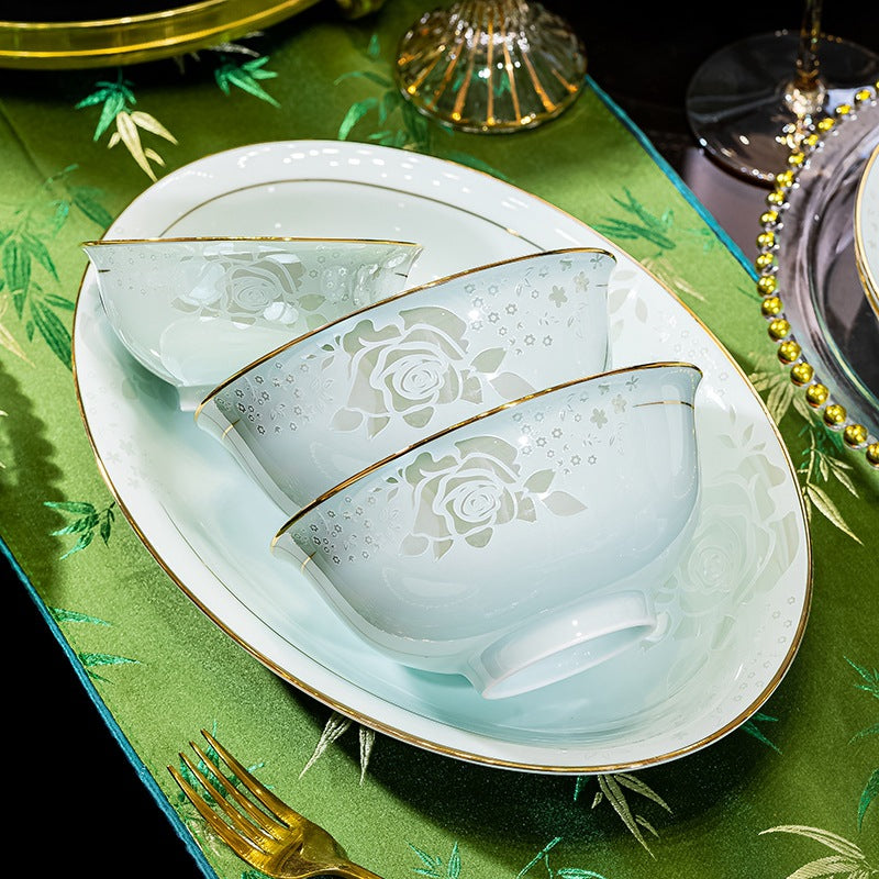 Qing Ci Fan Hua pale celadon porcelain bowls with floral relief detail