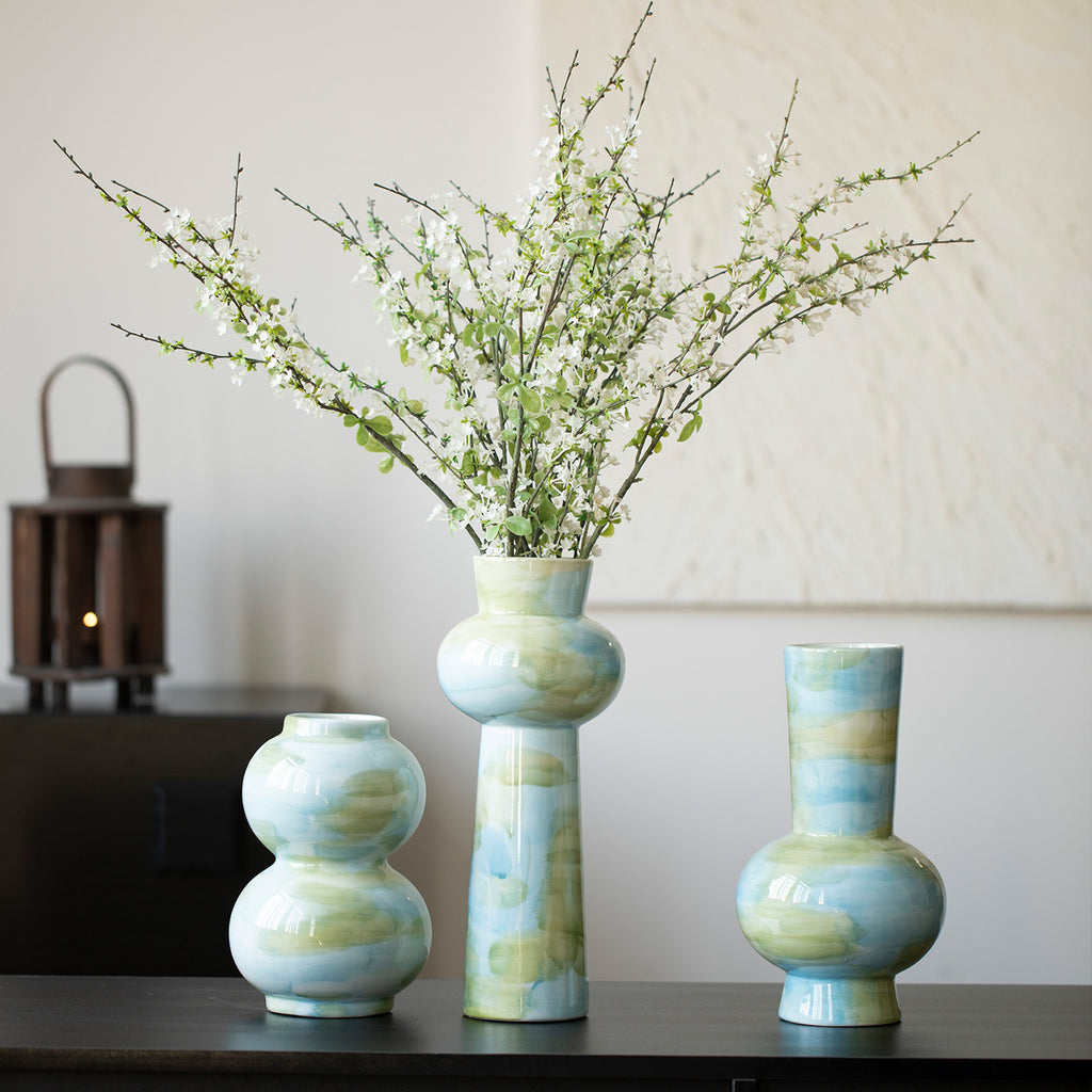 Qingxi celadon blue-green ceramic vases styled with white flowering branches