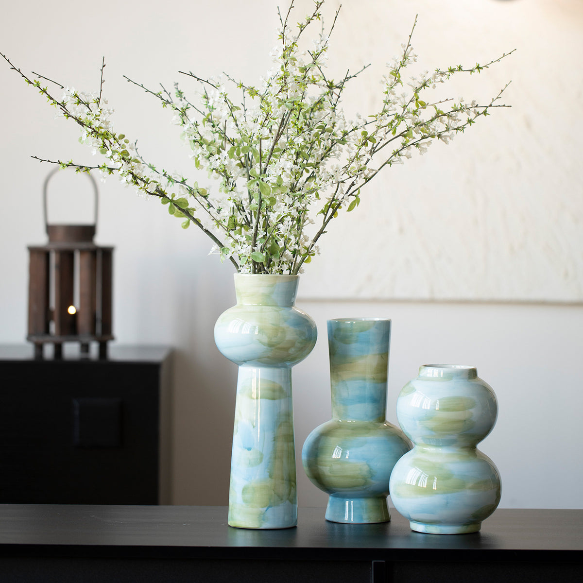 Qingxi celadon sculptural vase collection styled with greenery