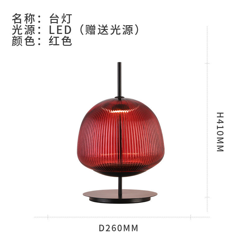 Red ribbed glass lantern table lamp, approximately 26 cm diameter and 41 cm high
